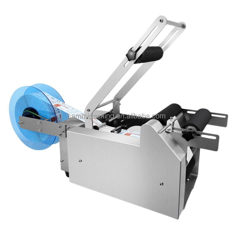 آلة لصق الملصقات على القارورات الزجاجية سعة 10 مل شبه أوتوماتيكية، تعبئة أفقية للزجاجات في علب/علب، محرك كهربائي، حالة جديدة